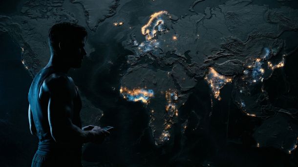 A topographic world map overlaid with biometric data heat points showing regional male physiological variation in height, testosterone, and muscle composition