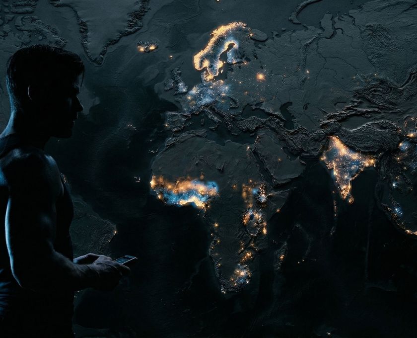 A topographic world map overlaid with biometric data heat points showing regional male physiological variation in height, testosterone, and muscle composition