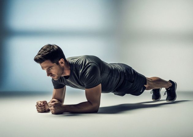 Man holding a plank position, demonstrating core strength and control